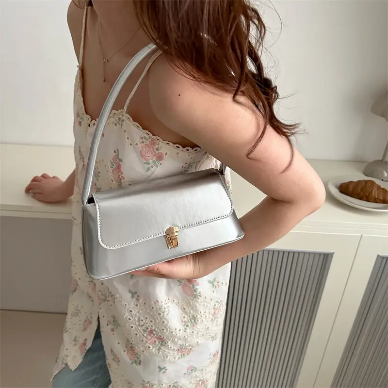 Women's Silver Crossbody Bag with Gold Clasp - Image 6