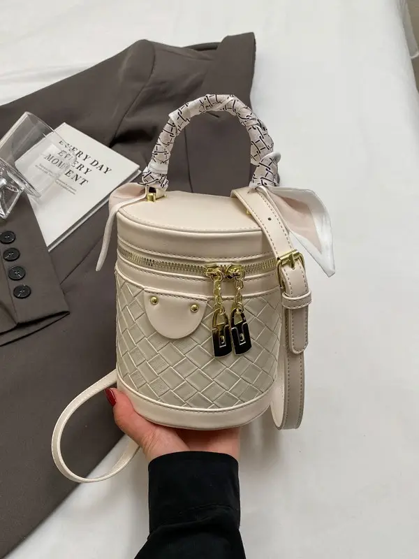 White Woven Silk Handbag with Gold Tassel Handles - Image 8