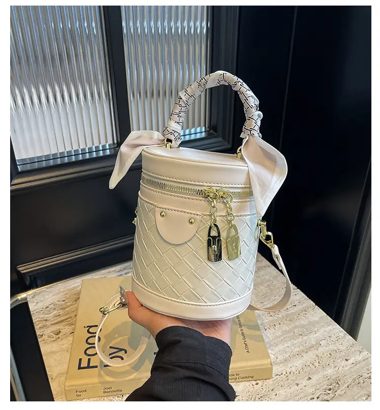 White Woven Silk Handbag with Gold Tassel Handles — feature 10