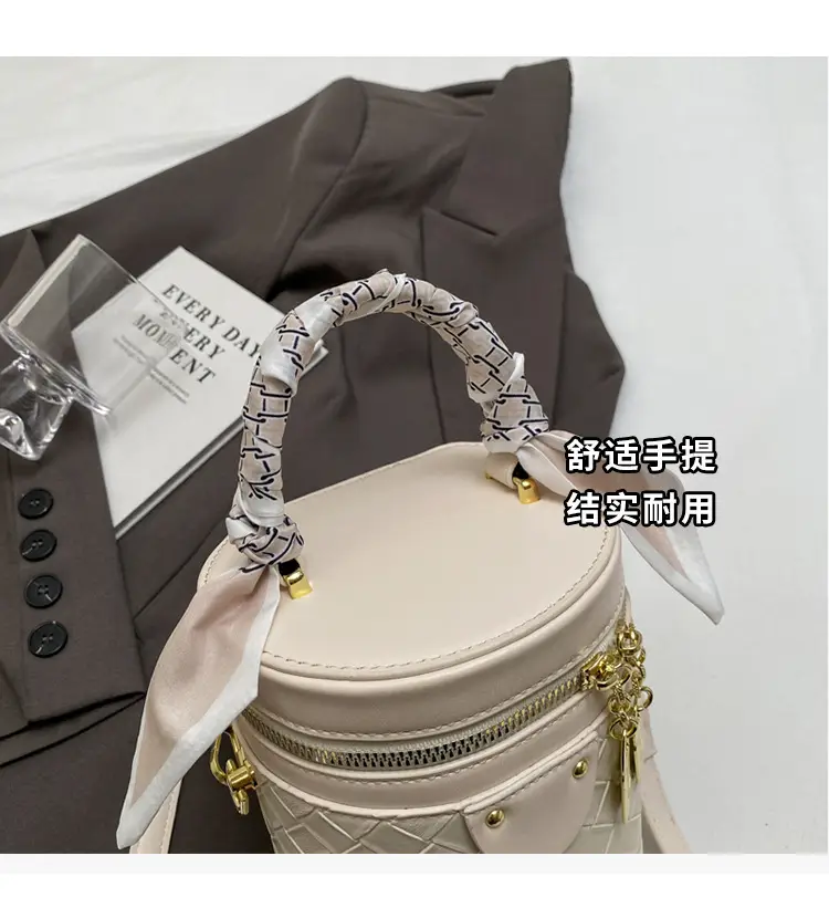 White Woven Silk Handbag with Gold Tassel Handles — feature 15
