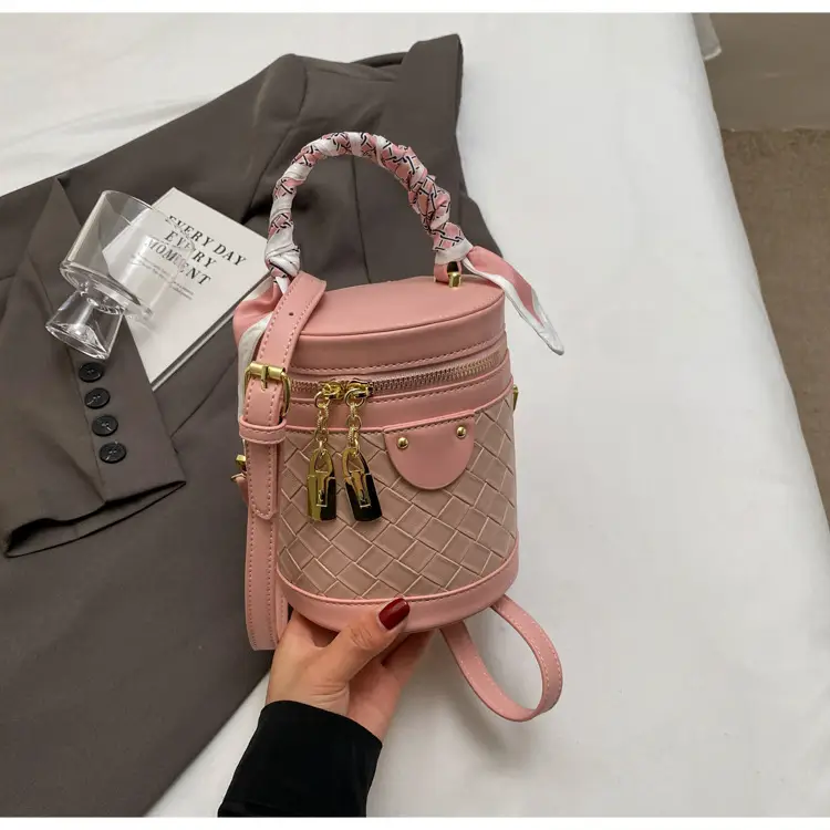 White Woven Silk Handbag with Gold Tassel Handles — feature 27