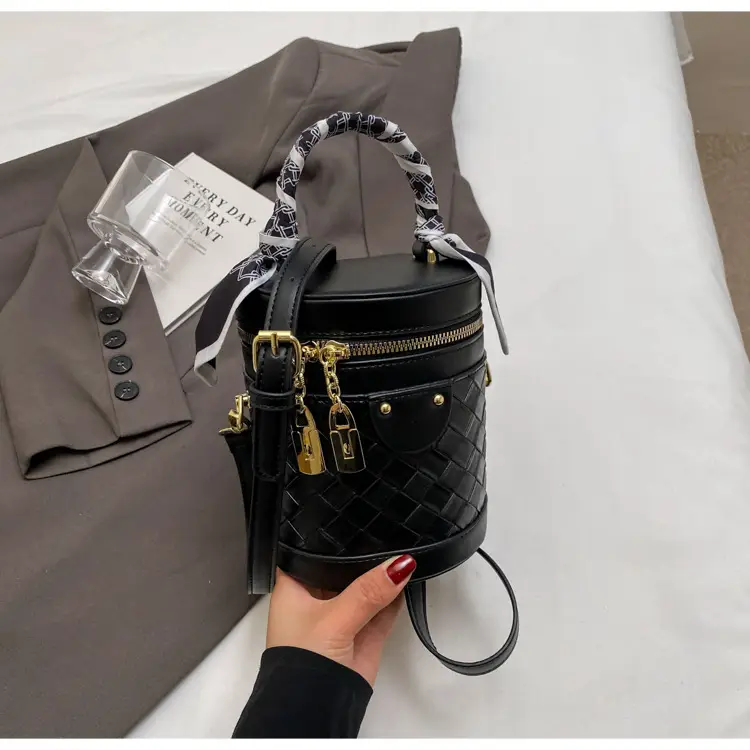 White Woven Silk Handbag with Gold Tassel Handles — feature 29