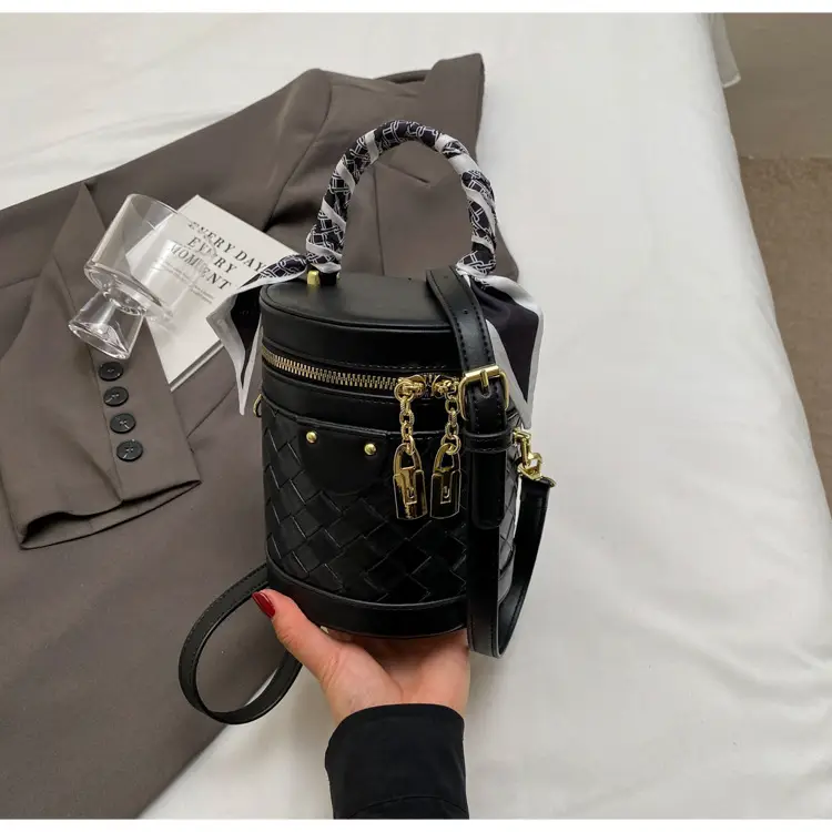 White Woven Silk Handbag with Gold Tassel Handles — feature 30