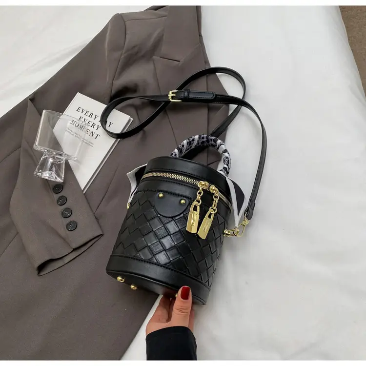 White Woven Silk Handbag with Gold Tassel Handles — feature 31