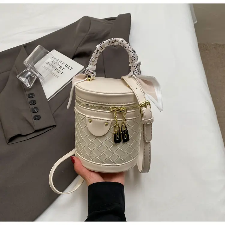 White Woven Silk Handbag with Gold Tassel Handles — feature 32