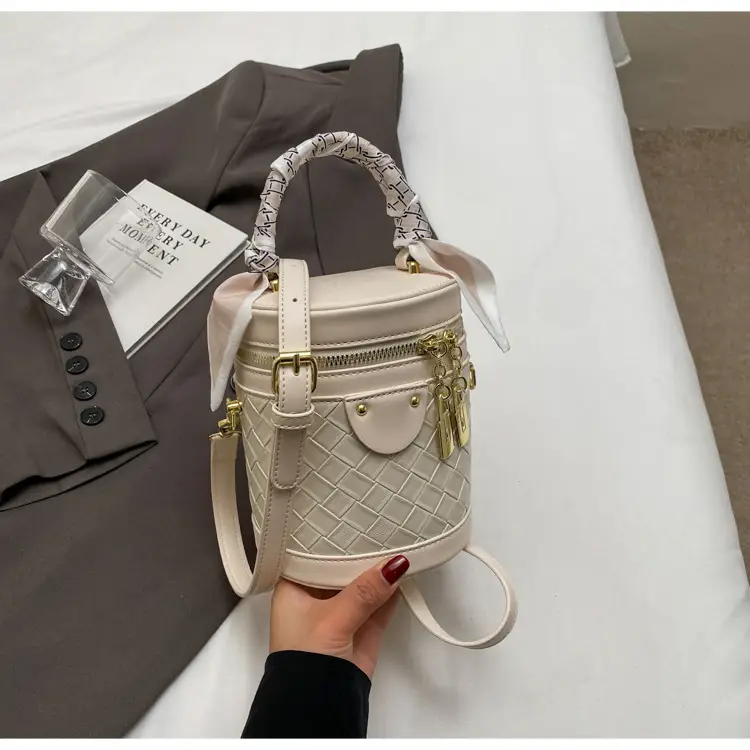 White Woven Silk Handbag with Gold Tassel Handles — feature 33
