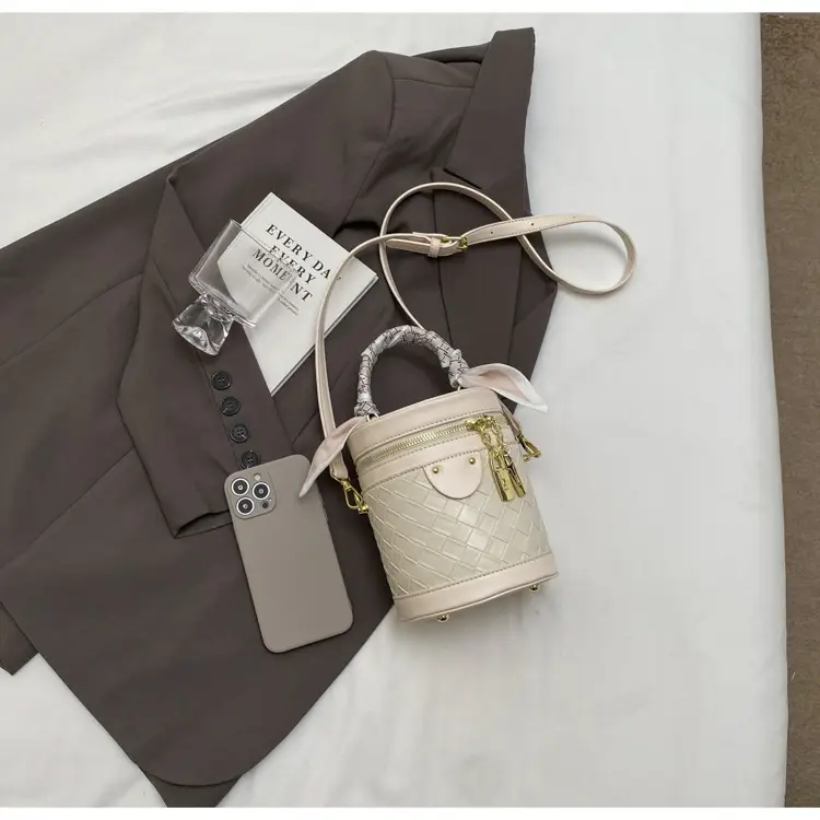 White Woven Silk Handbag with Gold Tassel Handles — feature 36