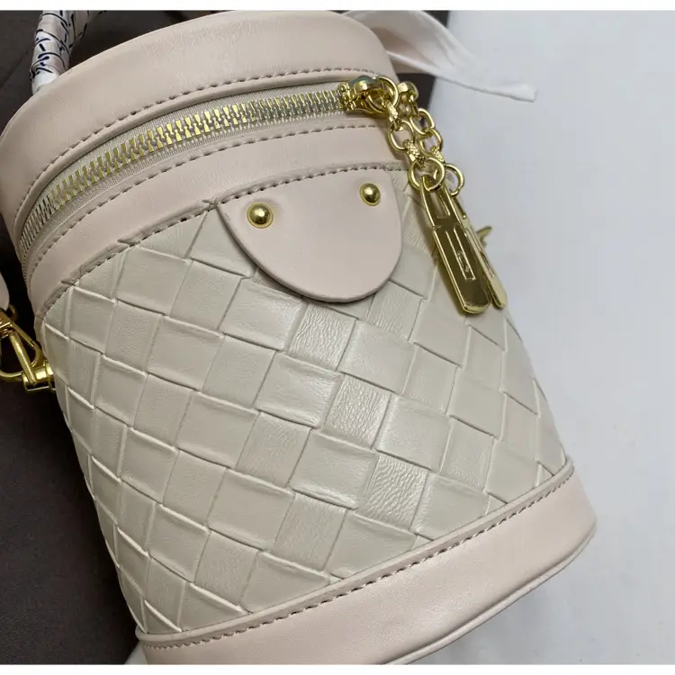 White Woven Silk Handbag with Gold Tassel Handles — feature 37
