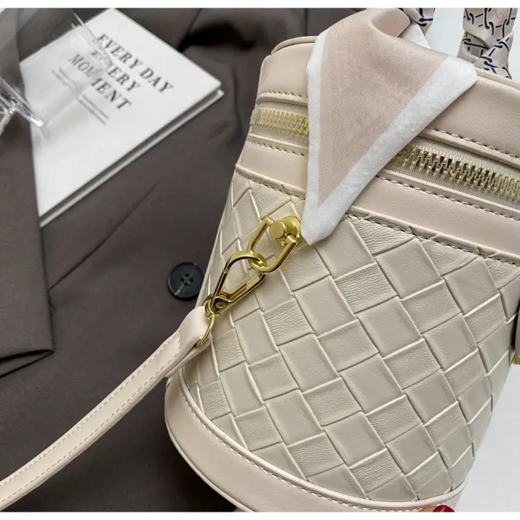 White Woven Silk Handbag with Gold Tassel Handles — feature 41