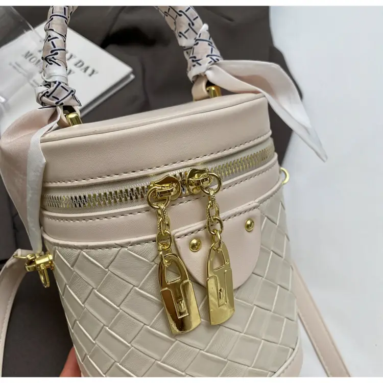 White Woven Silk Handbag with Gold Tassel Handles — feature 43