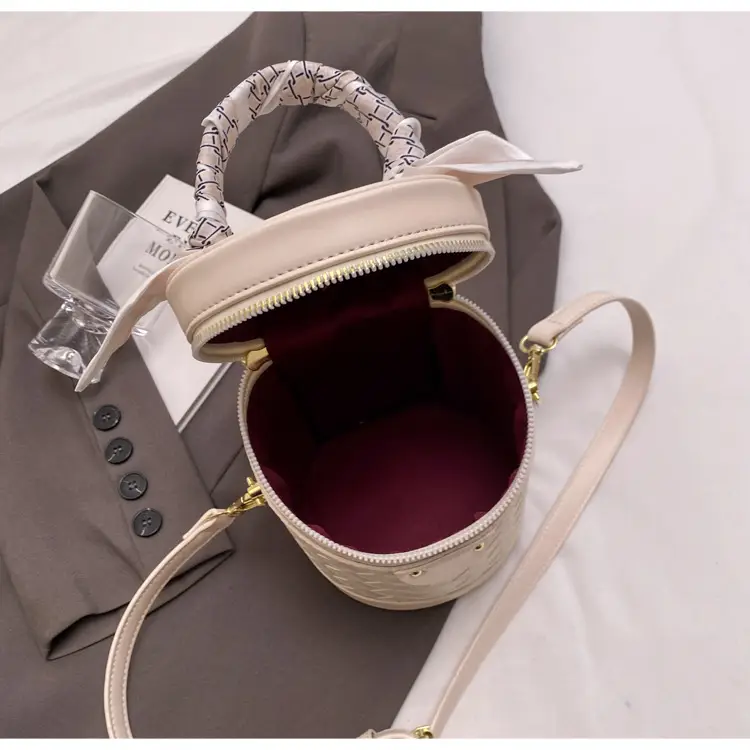 White Woven Silk Handbag with Gold Tassel Handles — feature 44