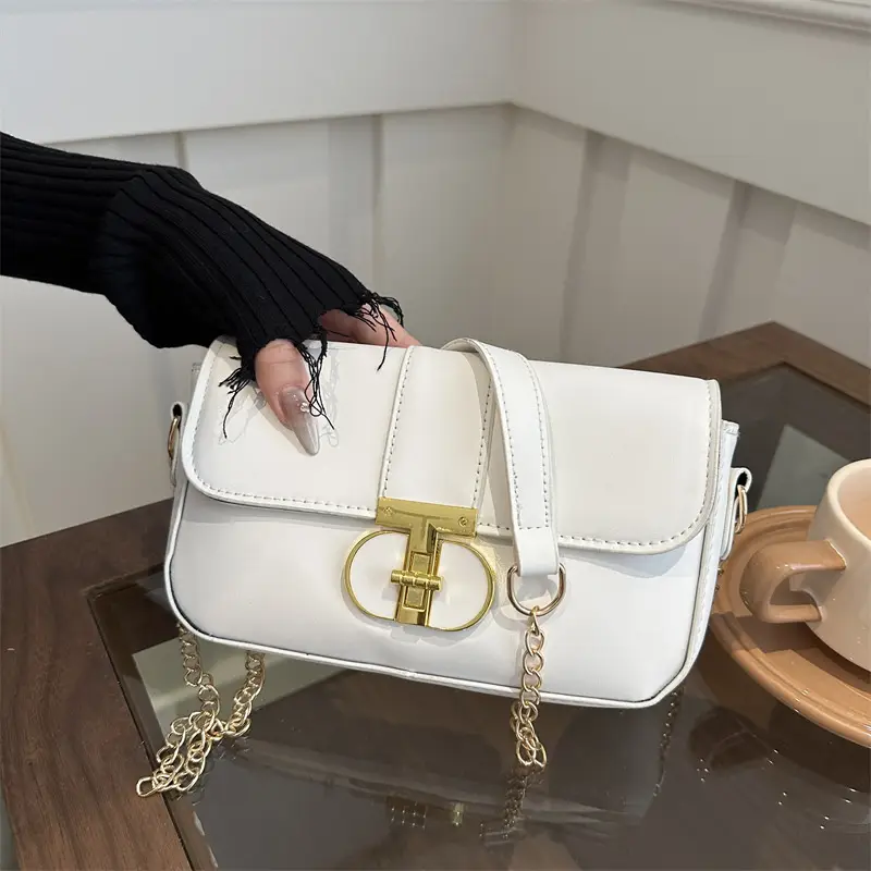 Small Black Crossbody Bag with Gold Clasp for Women - Image 2