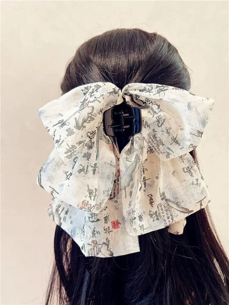 French Retro Bow Hairpin with Black Houndstooth Design — feature 49