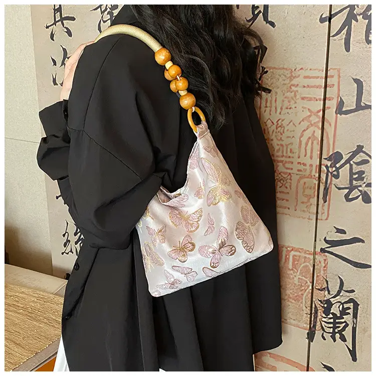 Artistic Embroidered Women's Shoulder Bag with Wooden Handles — feature 17