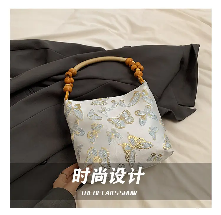 Artistic Embroidered Women's Shoulder Bag with Wooden Handles — feature 4