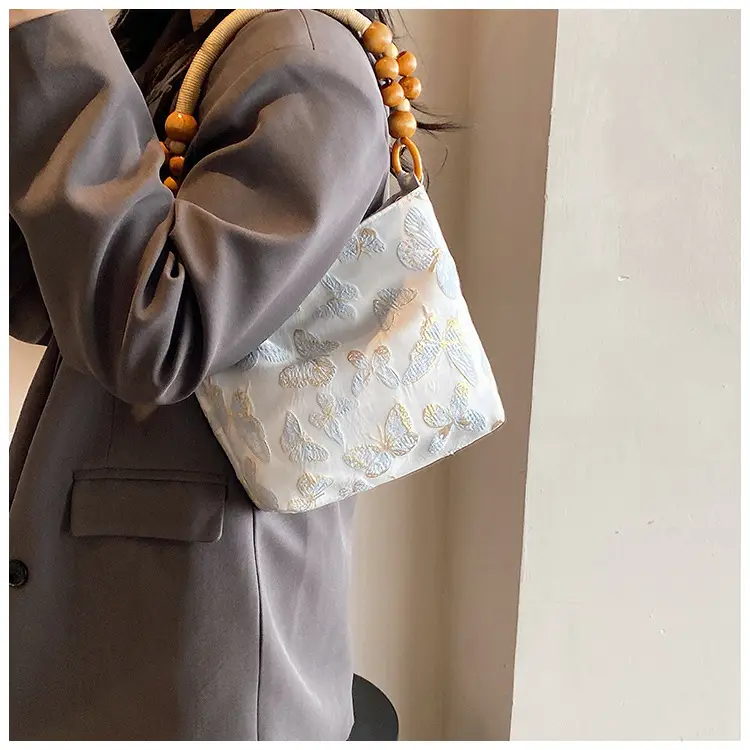 Artistic Embroidered Women's Shoulder Bag with Wooden Handles — feature 6