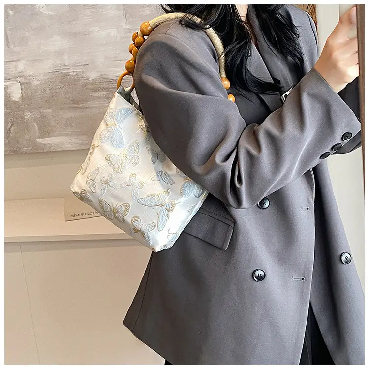 Artistic Embroidered Women's Shoulder Bag with Wooden Handles — feature 7