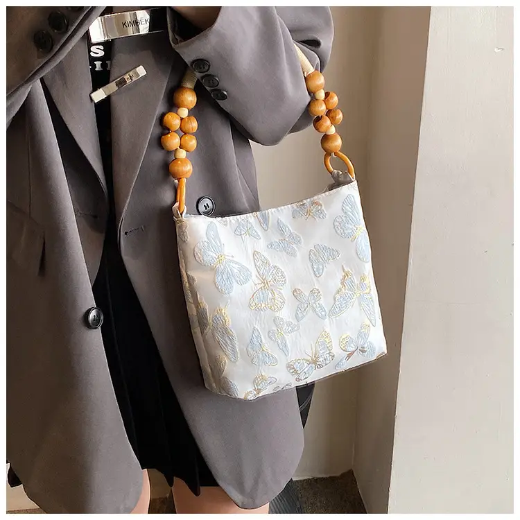 Artistic Embroidered Women's Shoulder Bag with Wooden Handles — feature 8