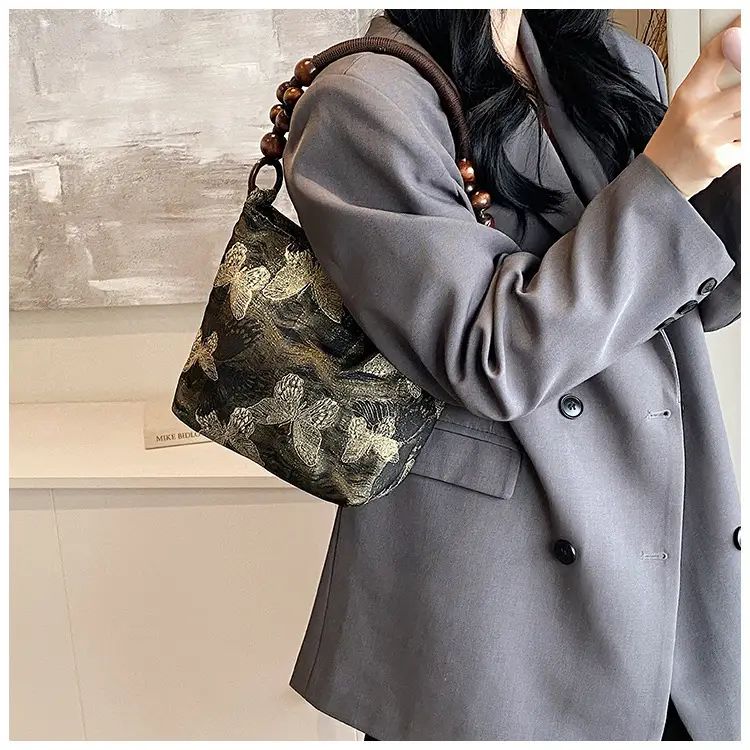 Artistic Embroidered Women's Shoulder Bag with Wooden Handles — feature 9