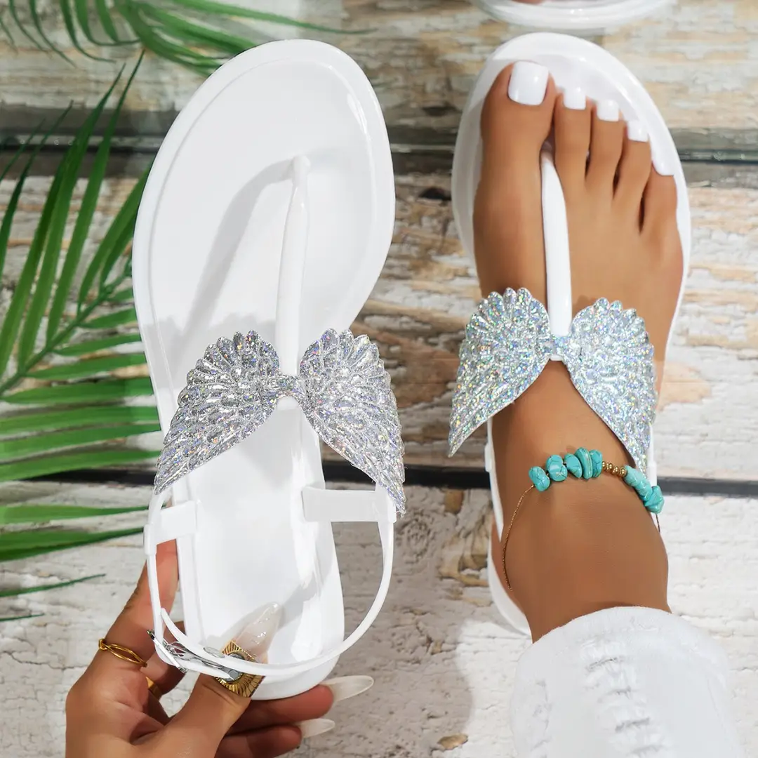 Cross-border hot European and American foreign trade summer new flat pvc beach flip-flops sandals non-slip crystal bow - Image 4