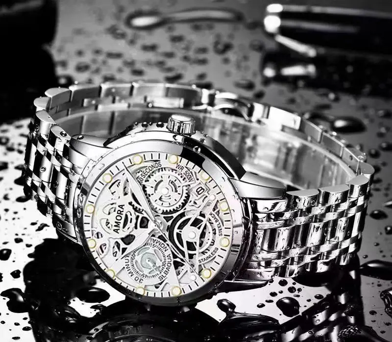 Gold Skeleton Watch with Luminous Dial & Stainless Band — feature 12