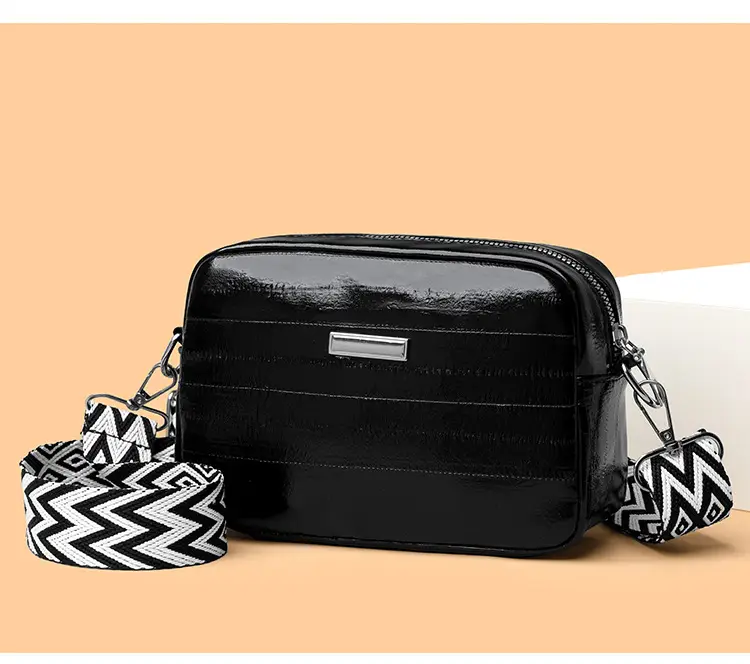 Black Glossy Crossbody Bag with Zigzag Strap — feature 10