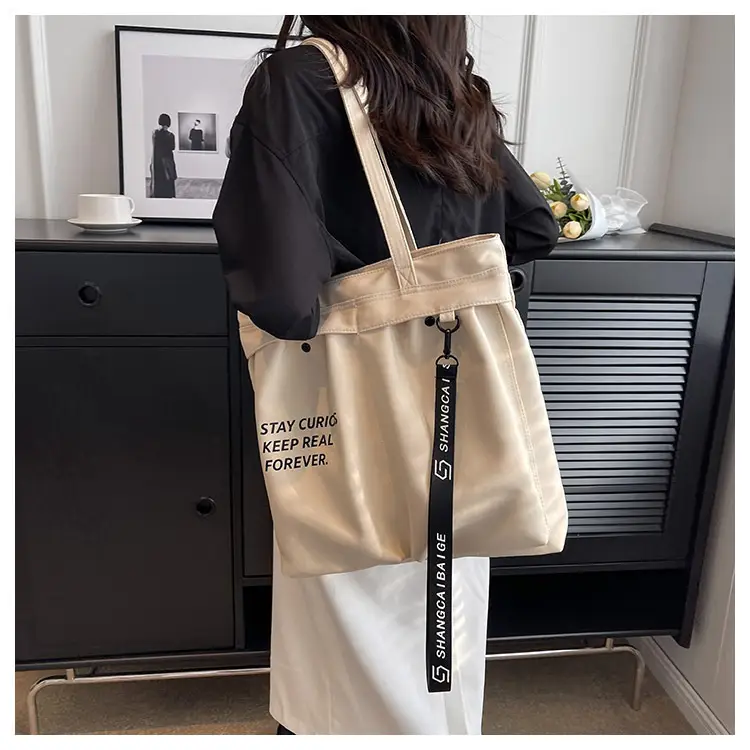 Blue Canvas Shoulder Bag for College Students 2026 — feature 17