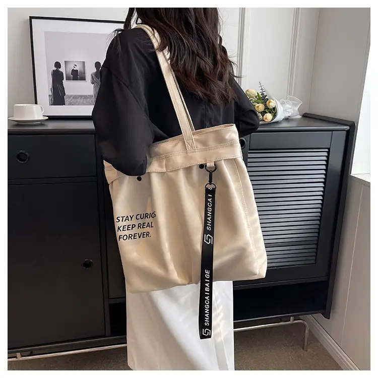 Blue Canvas Shoulder Bag for College Students 2026 — feature 19