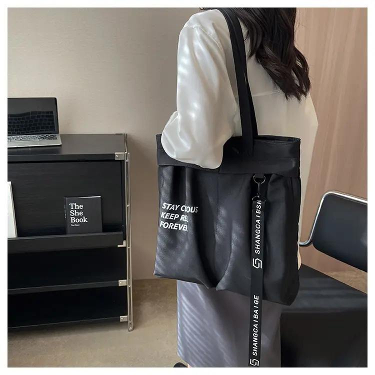 Blue Canvas Shoulder Bag for College Students 2026 — feature 23