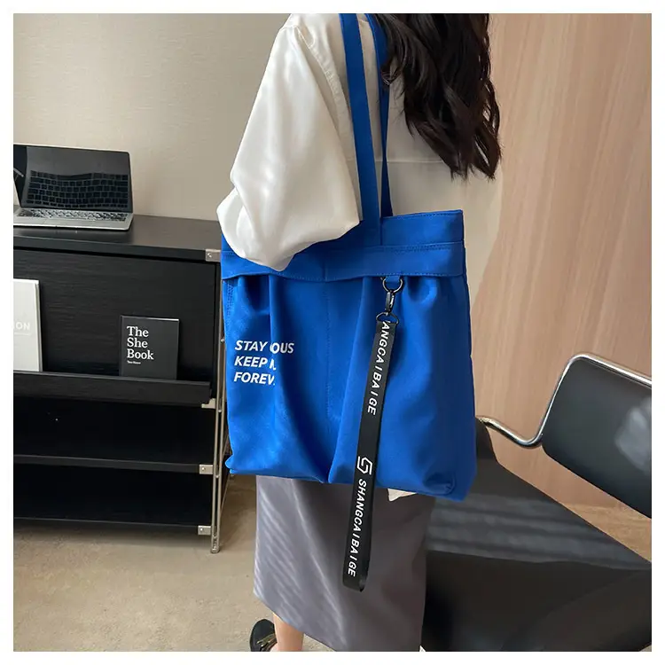 Blue Canvas Shoulder Bag for College Students 2026 — feature 28
