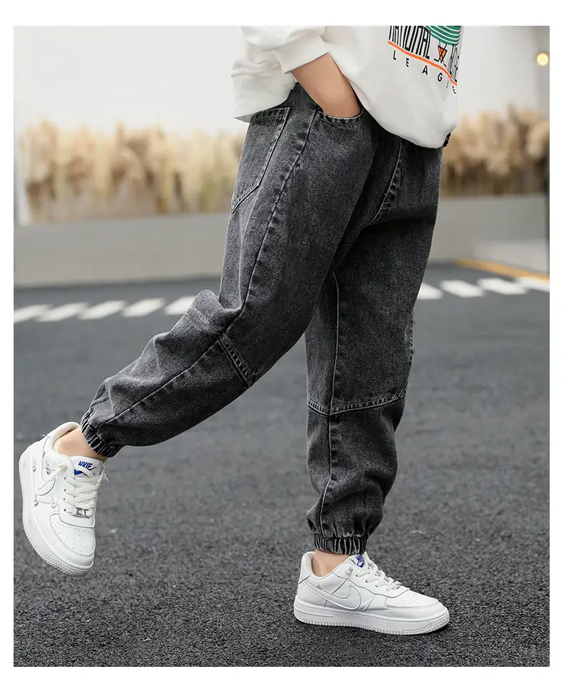 Children's jeans boys 2024 factory wholesale walking pants spring and autumn new big and small children's black trousers — feature 14