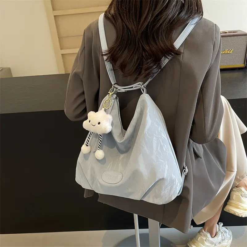Women's Silver Textured Shoulder Bag with Cute Charm - Image 7