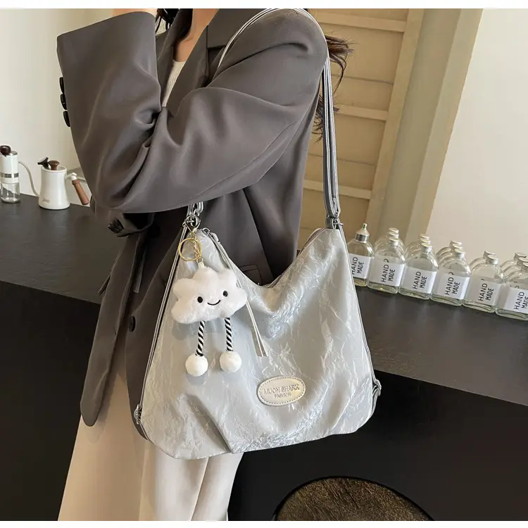 Women's Silver Textured Shoulder Bag with Cute Charm — feature 33