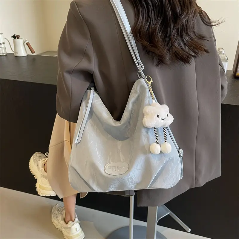Women's Silver Textured Shoulder Bag with Cute Charm - Image 3