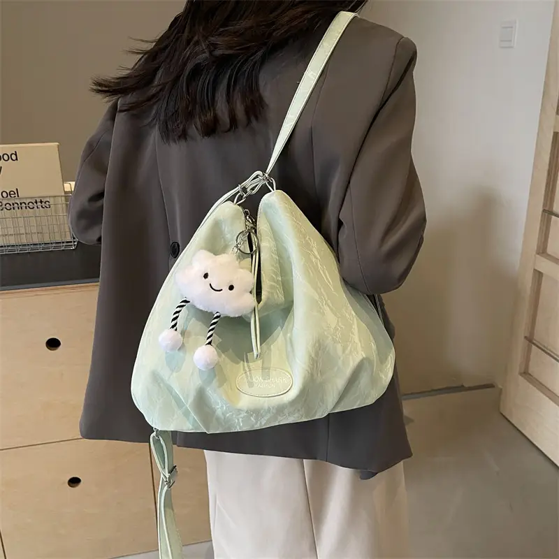 Women's Silver Textured Shoulder Bag with Cute Charm - Image 4