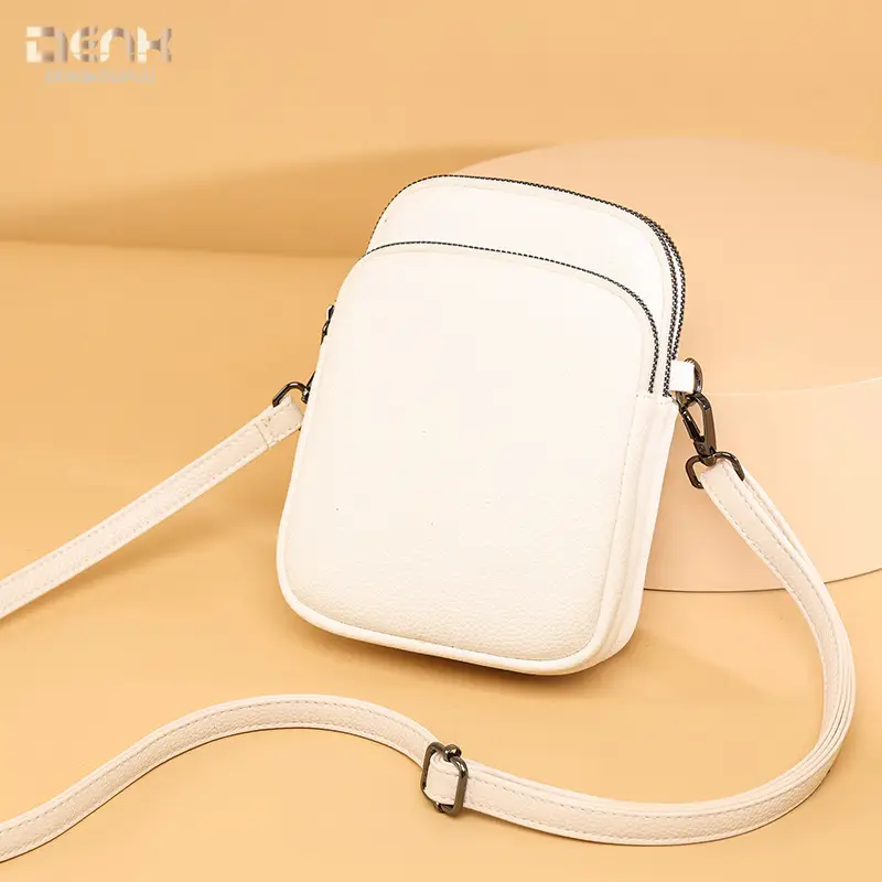 Denk Crossbody Bag Tan PU Leather 2024