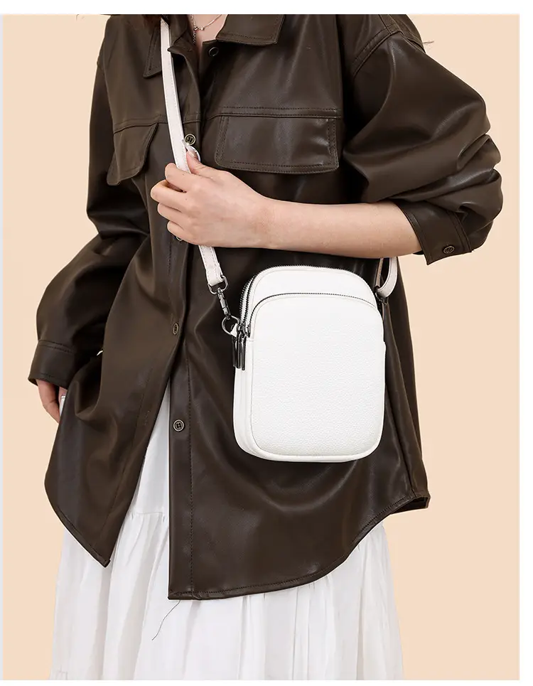 Denk Crossbody Bag Tan PU Leather 2024 — feature 24