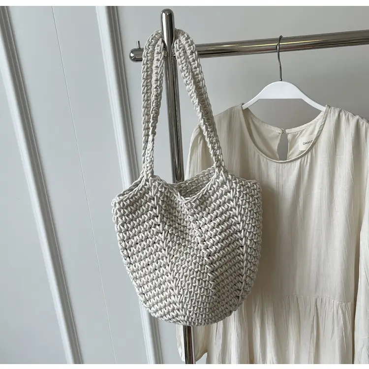 Women's Hollow Woven Bucket Bag Large Capacity Travel Bag — feature 24