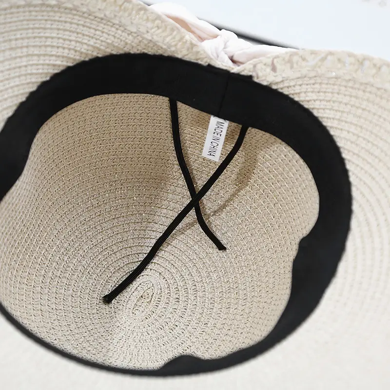 Wide-brimmed straw sunhat with lace bow for summer beach wear — feature 5