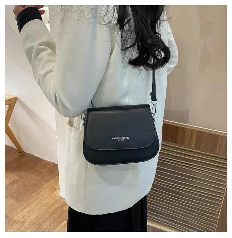 Trendy Blue Saddle Crossbody Bag for Women 2026 — feature 35
