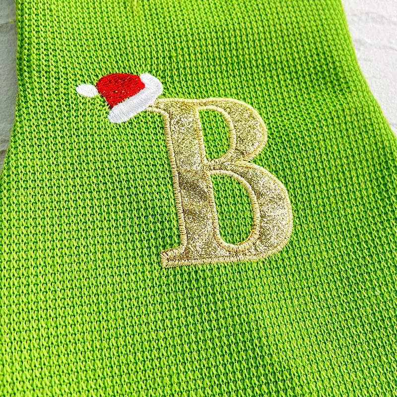 Green Knitted Christmas Stocking with Hair Monster Design - Image 30