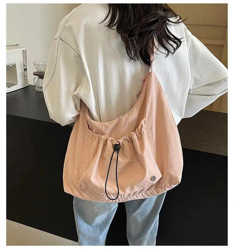 Pink Folded Shoulder Bag with Drawstring Closure — feature 1