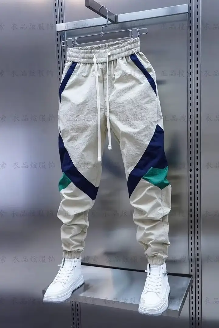 Men Beige Stripe Track Pants with White Sneakers — feature 10