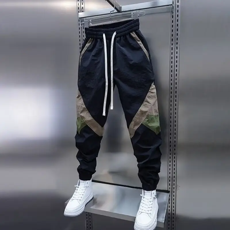 Men Beige Stripe Track Pants with White Sneakers — feature 5