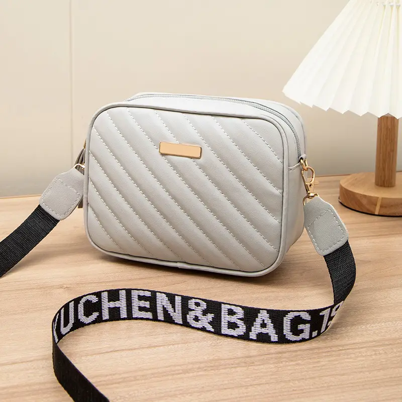 Women's Red Quilted Crossbody Bag with Letter Strap - Image 2