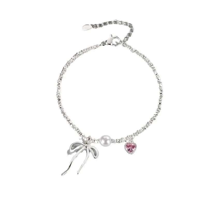 Broken Silver Bracelet with Love Bow & Pearl Accents — feature 1