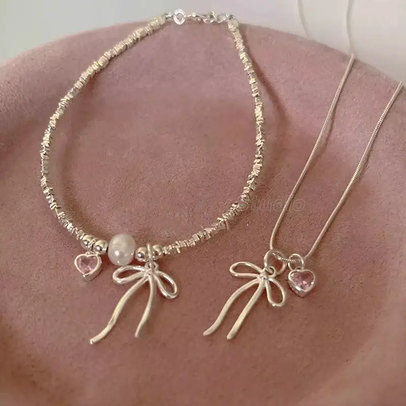 Broken Silver Bracelet with Love Bow & Pearl Accents — feature 10