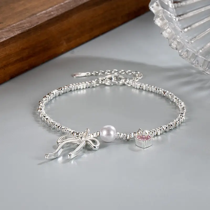 Broken Silver Bracelet with Love Bow & Pearl Accents — feature 5