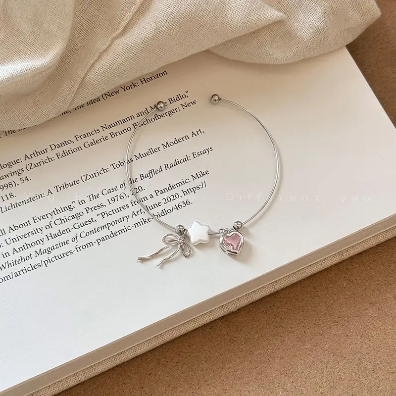Broken Silver Bracelet with Love Bow & Pearl Accents - Image 2
