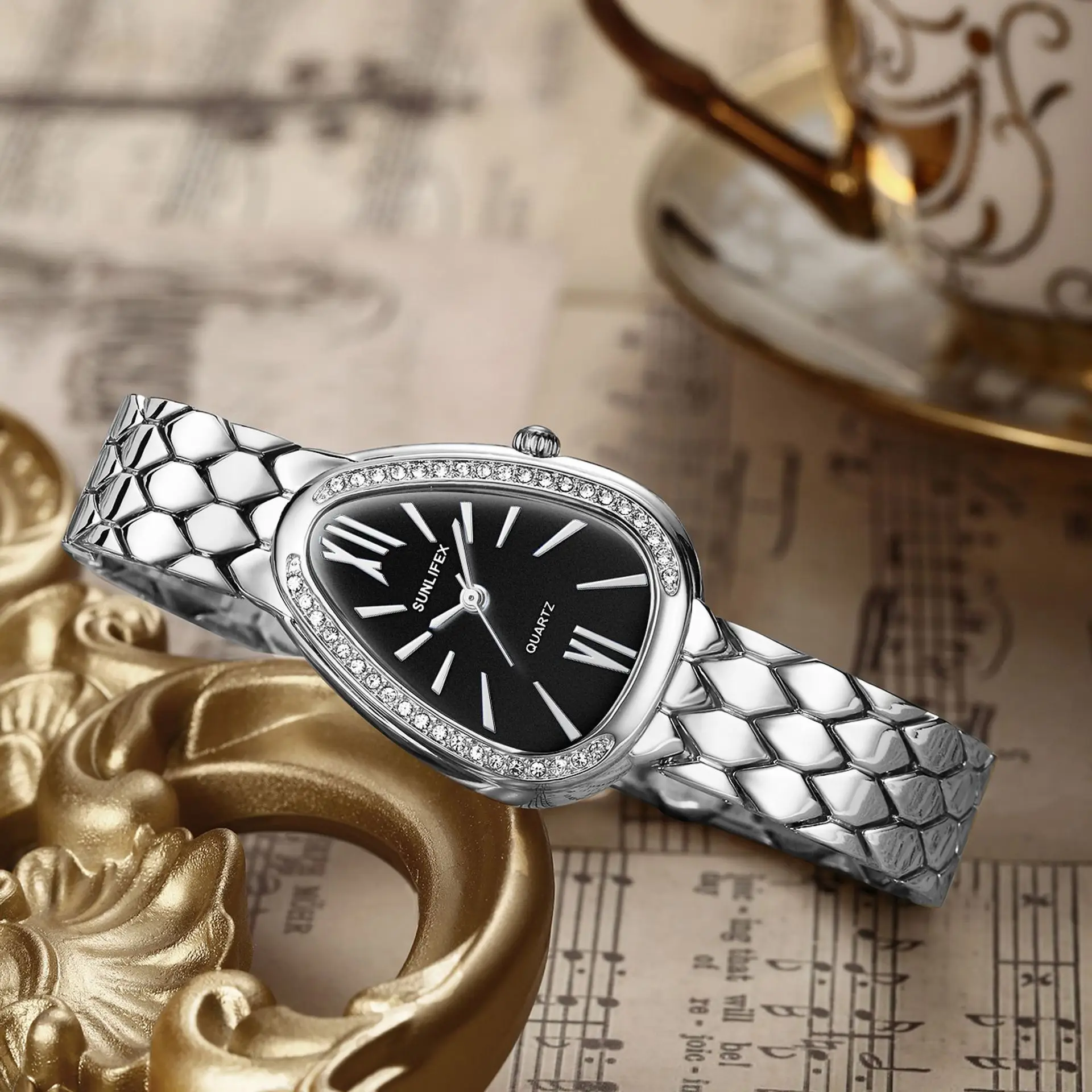 Women's Gold Snake Chain Watch with Diamond Dial — feature 18